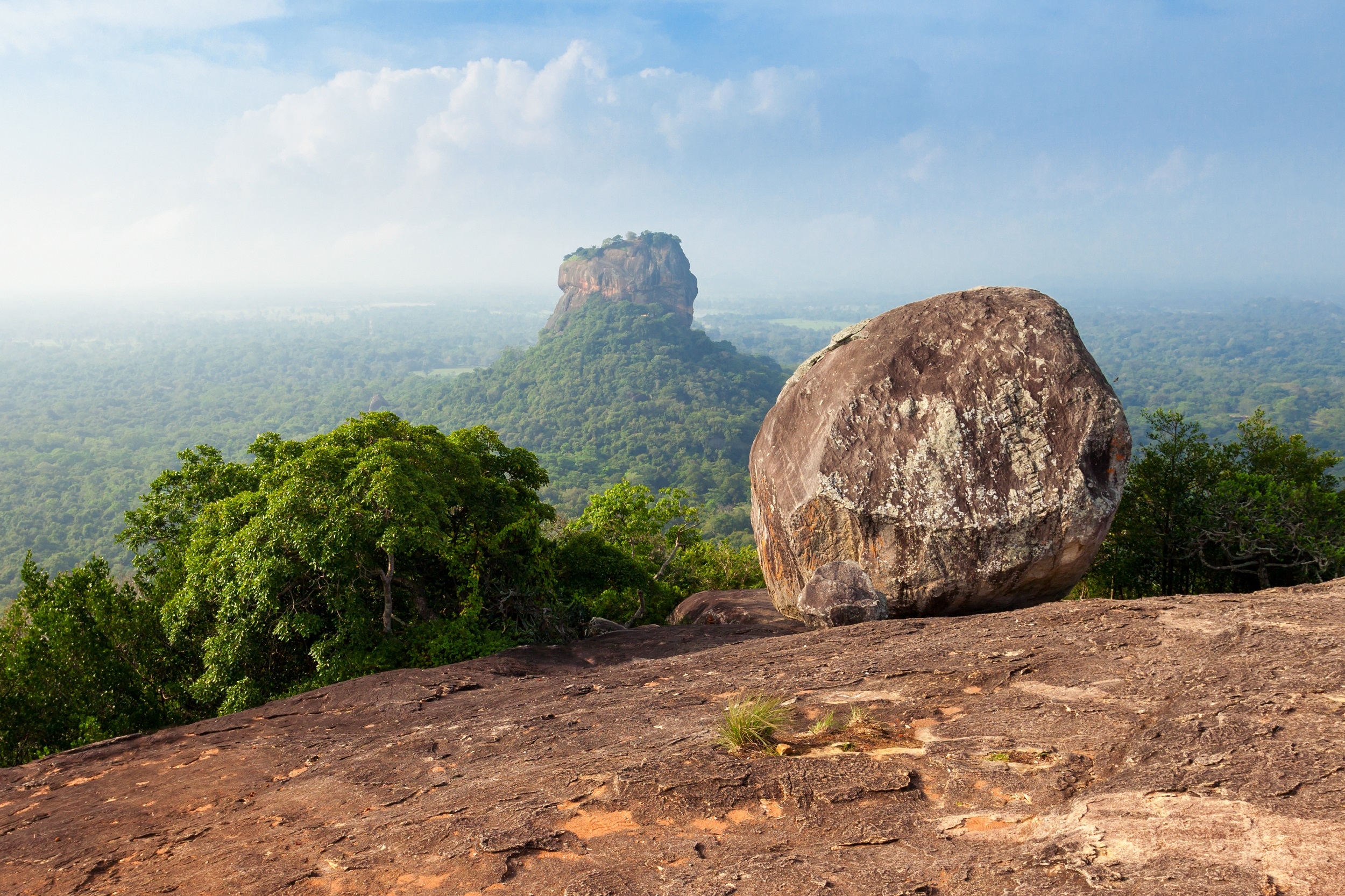 Sigiriya Rock or Sinhagiri or Lion Rock aerial panoramic view from Pidurangala Rock near Dambulla in Sri Lanka