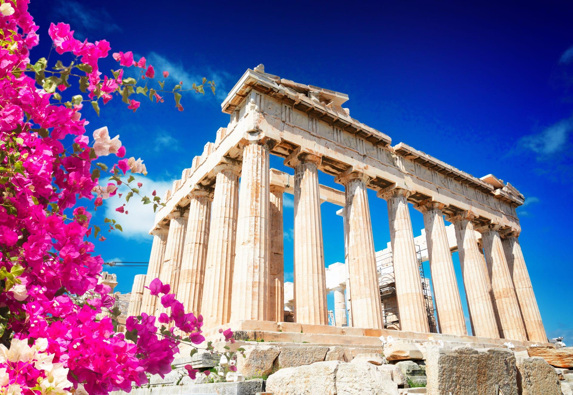  Parthenon temple over bright blue sky background, Acropolis hill, Athens Greecer with flowers - Image shutterstock_1017139666 1920x1280.jpg