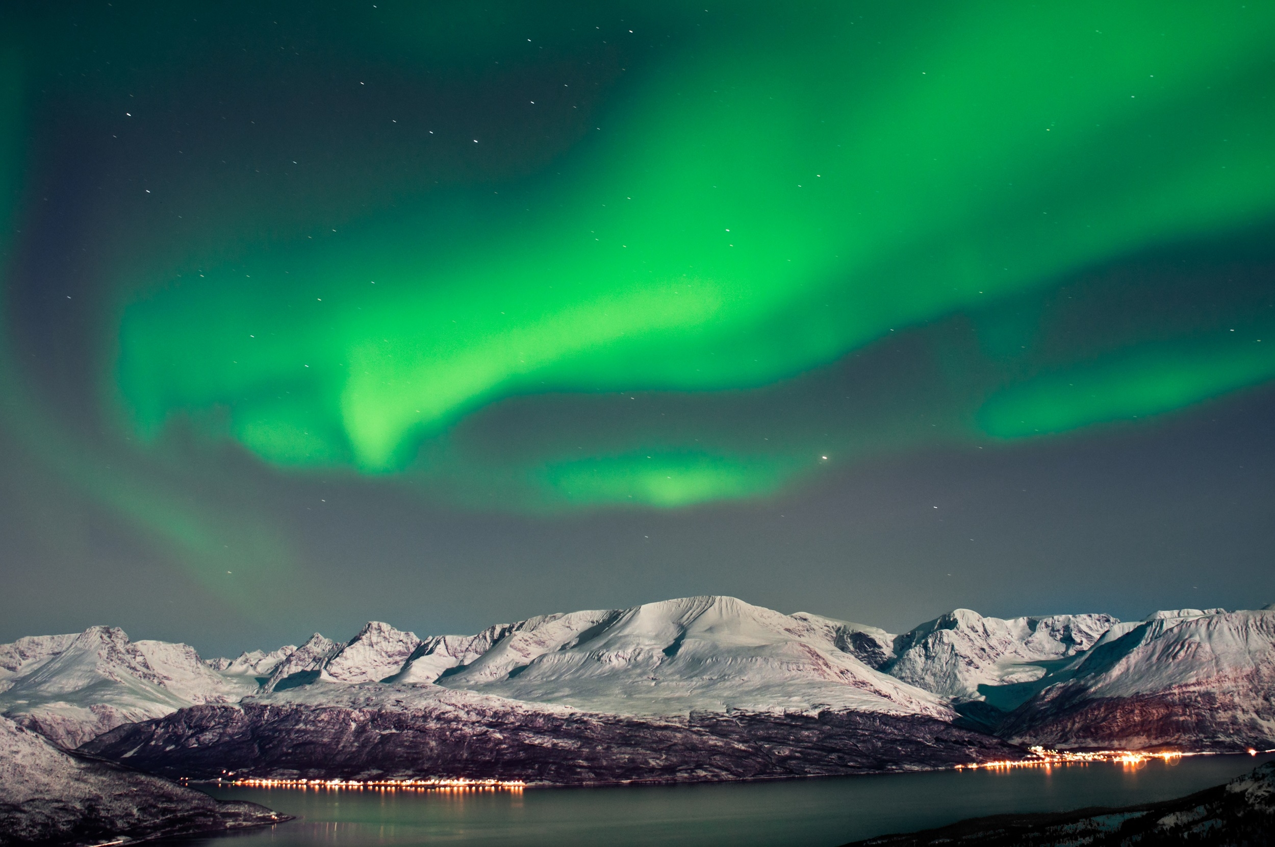Aurora above fjords in Norway